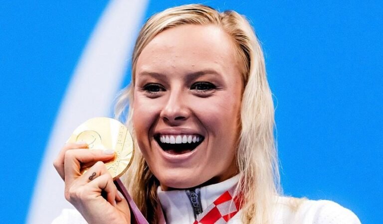 Legendinė JAV plaukikė J. Long, iškovojusi 14 -ąjį aukso medalį, padėkojo Jėzui