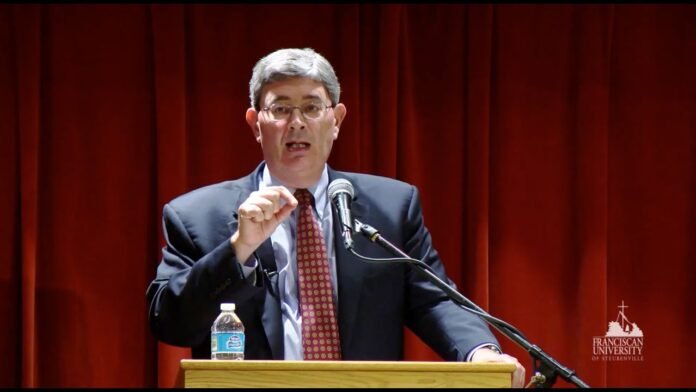 George'as Weigelis / Ekranvaizdis